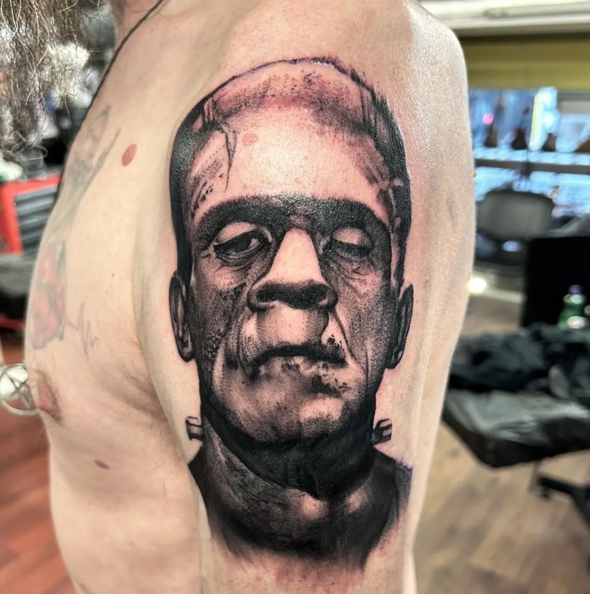 Frankenstein’s monster on the upper arm. Tattoo at Ink21 in Vienna.