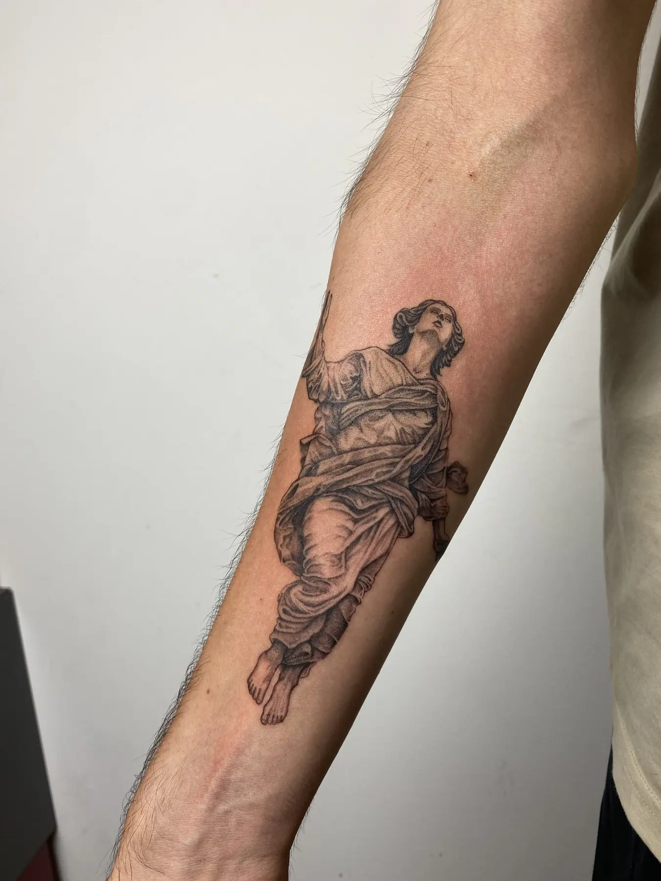 Classical figure drawing on the forearm. Tattoo at Ink21 in Vienna.