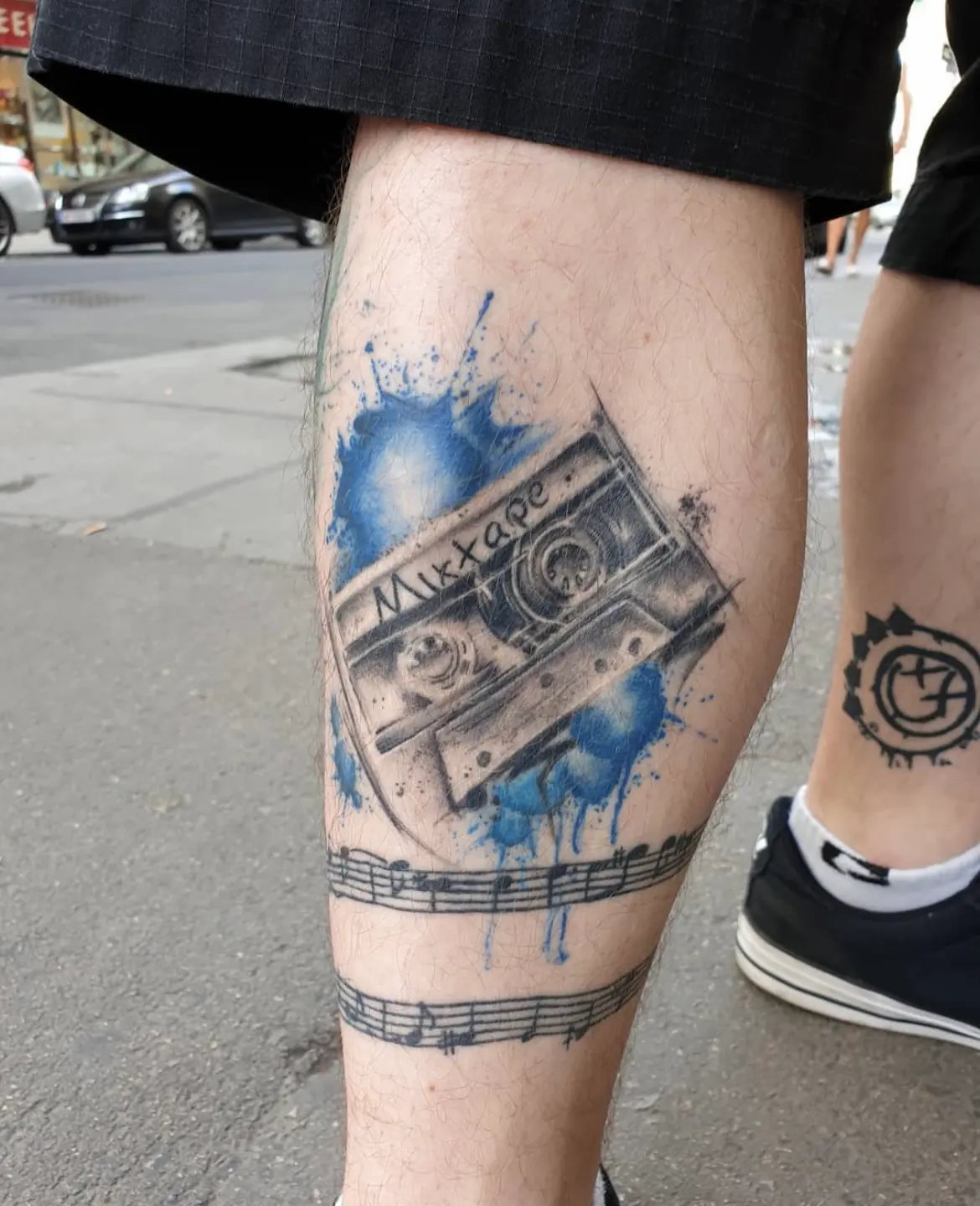 Mixtape with blue colour splashes. Tattoo at Ink21 in Vienna.