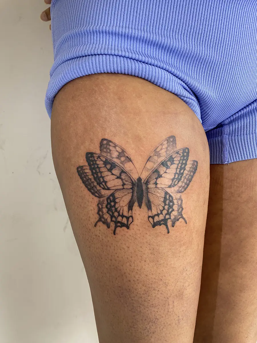 Butterfly with patterned wings. Tattoo at Ink21 in Vienna.