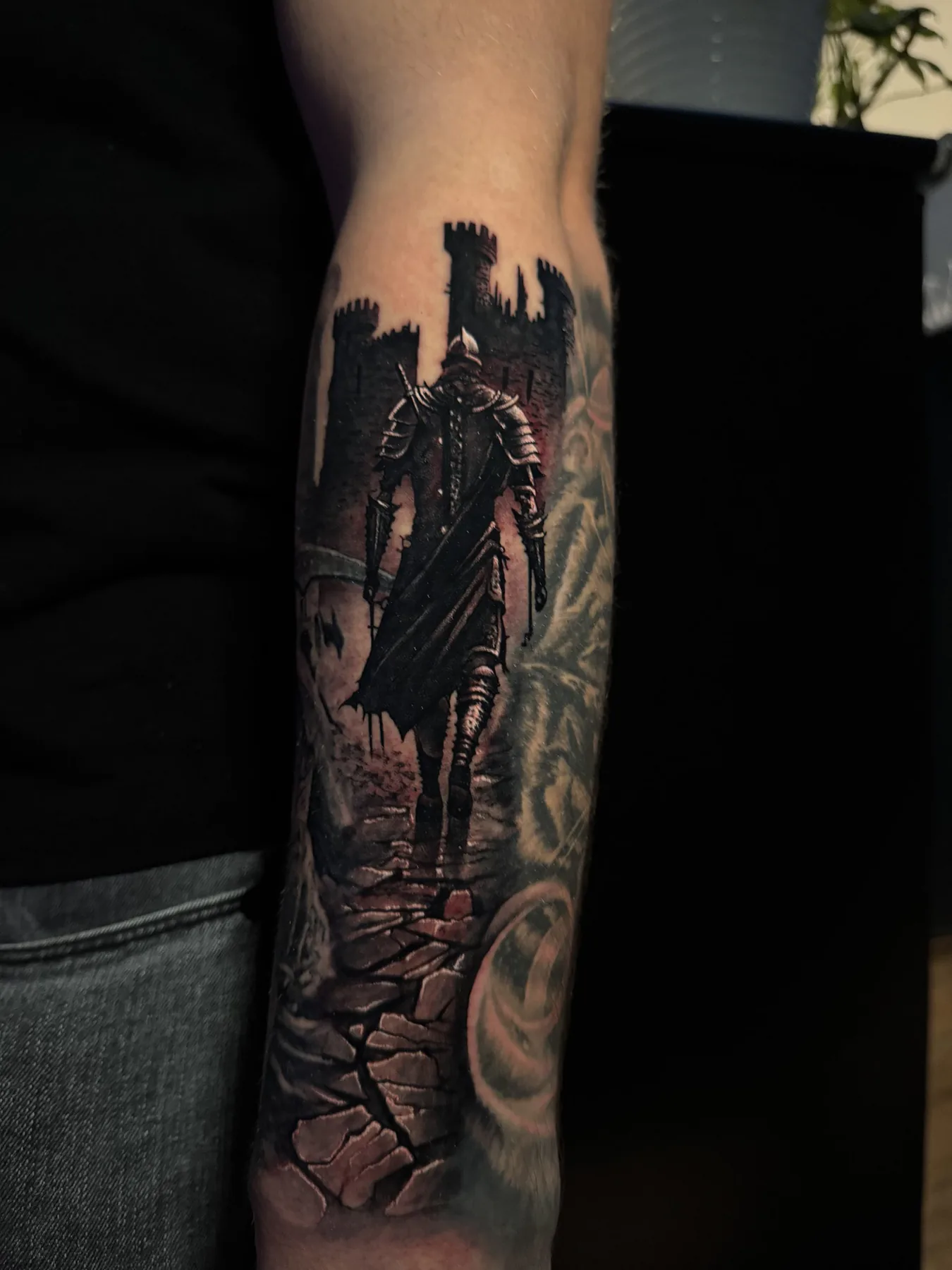 Armed figure in front of a castle. Tattoo at Ink21 in Vienna.