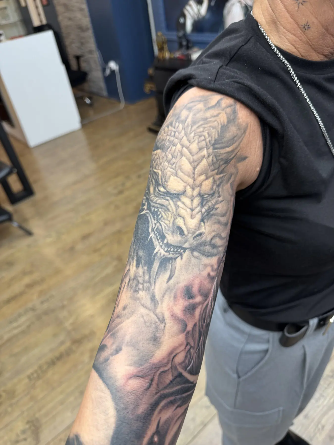 Dragon head with scales. Tattoo at Ink21 in Vienna.