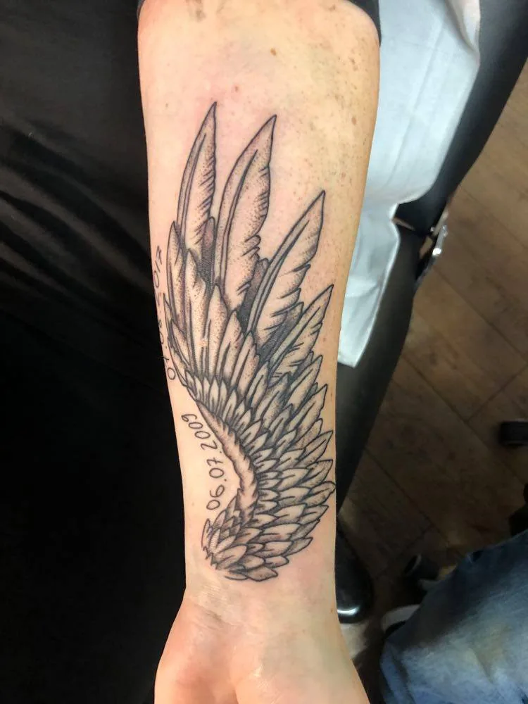 Single wing on the forearm. Tattoo at Ink21 in Vienna.