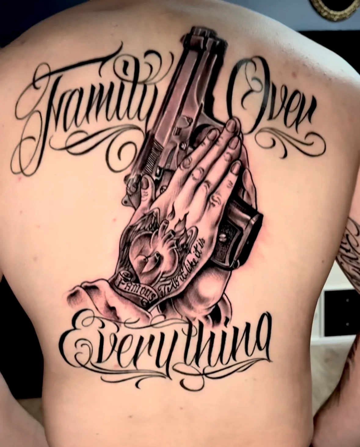 Family Over Everything back tattoo. Tattoo at Ink21 in Vienna.