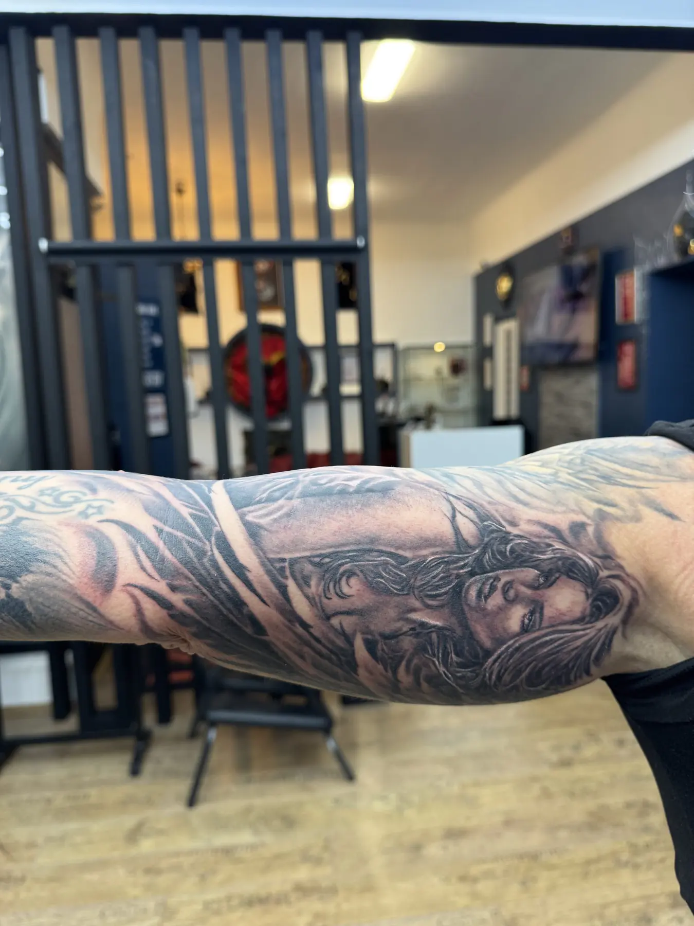 Portrait on an outstretched arm. Tattoo at Ink21 in Vienna.