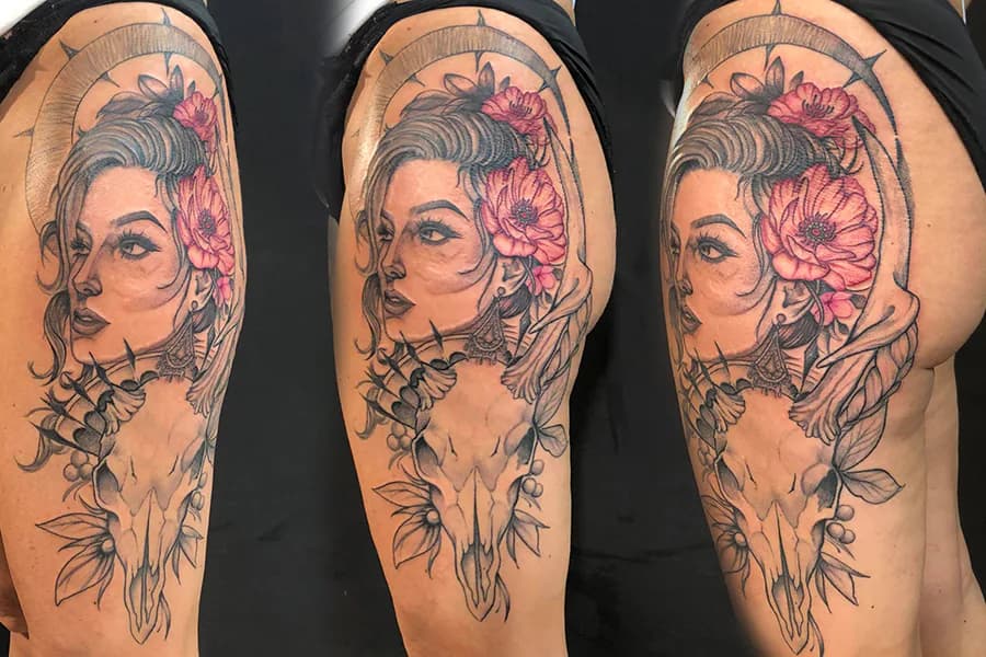 Woman’s portrait with a pink hair flower. Tattoo at Ink21 in Vienna.