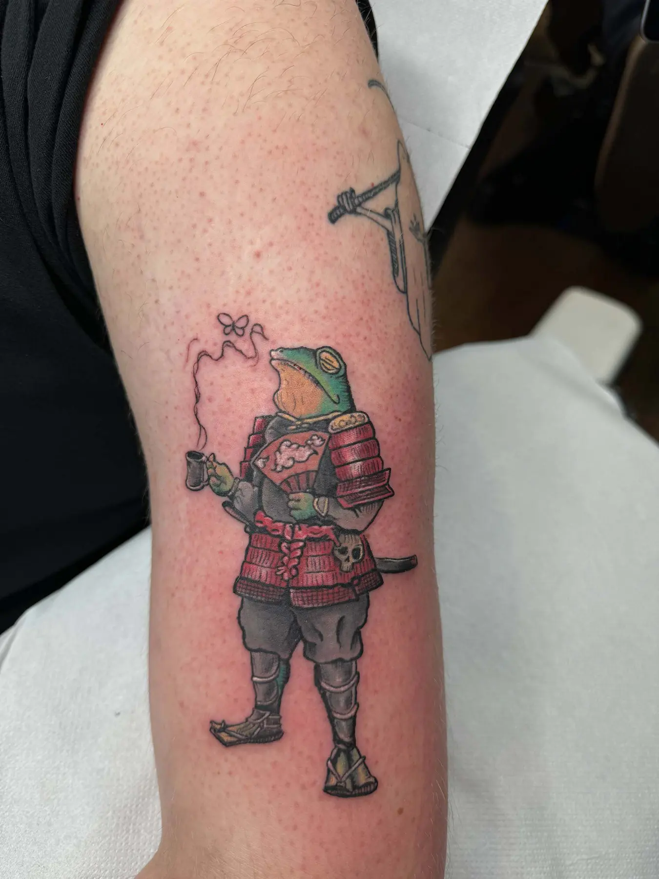 Frog warrior in red armour. Tattoo at Ink21 in Vienna.