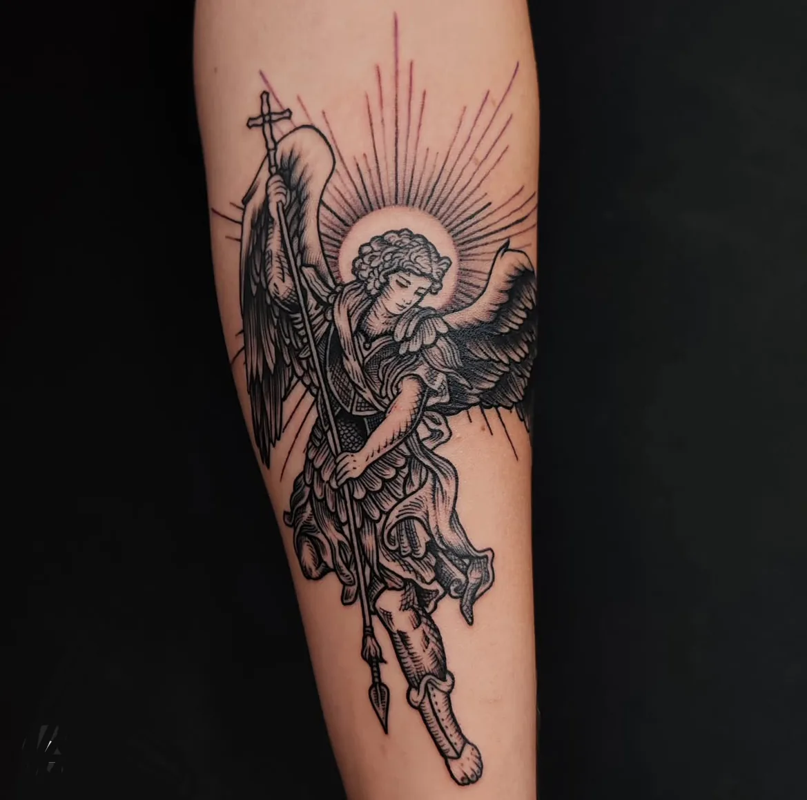 Winged angel holding a sword. Tattoo at Ink21 in Vienna.