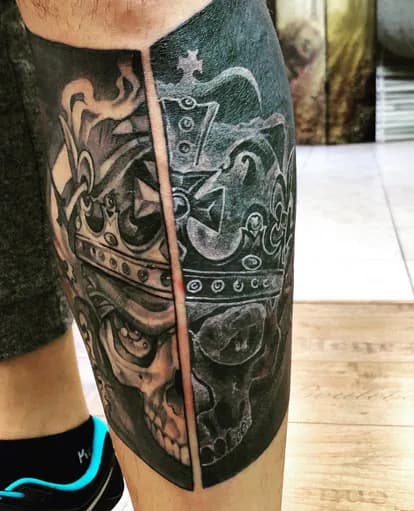 Crowned skull with a pale dividing line. Tattoo at Ink21 in Vienna.