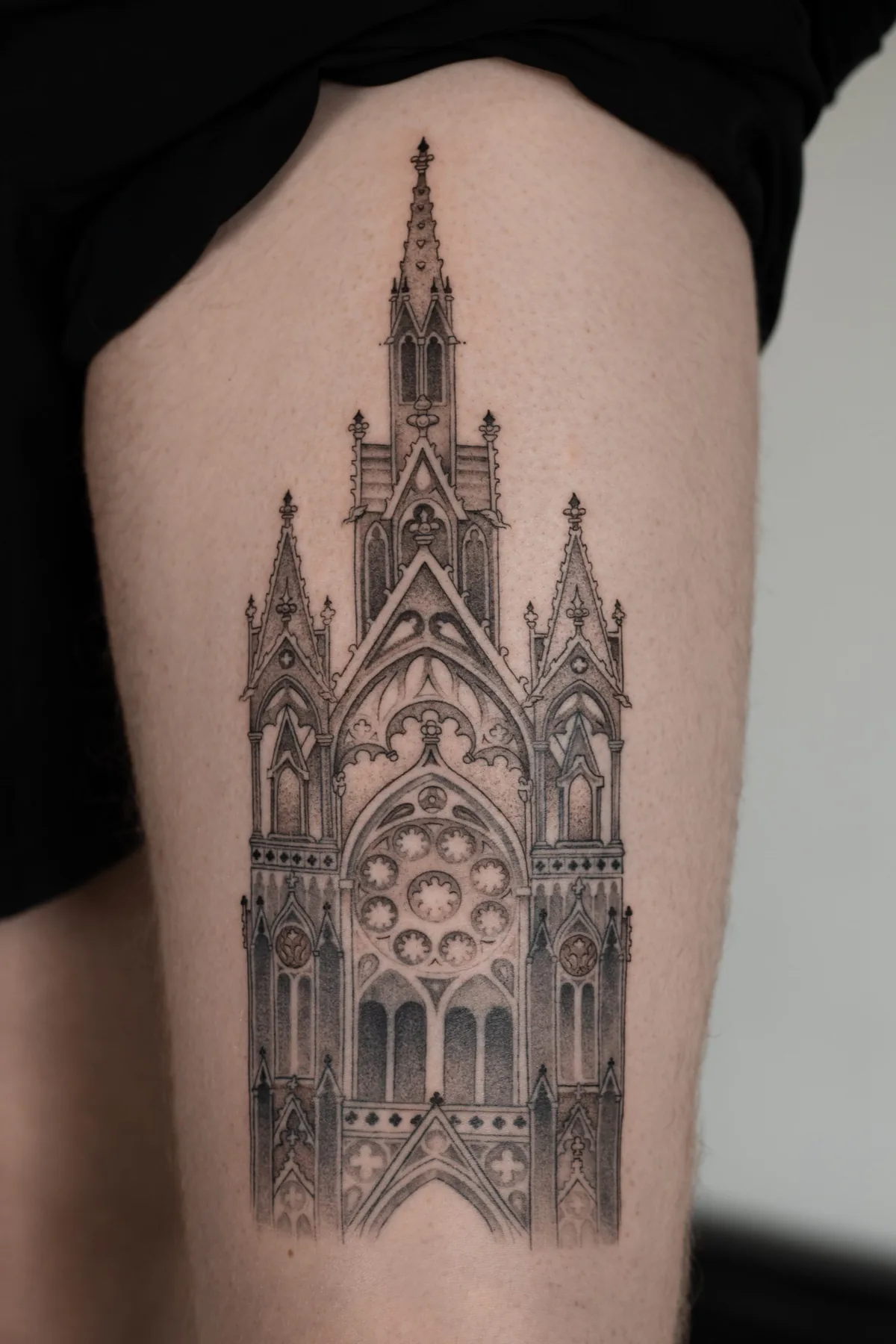 Gothic church facade on the thigh. Tattoo at Ink21 in Vienna.