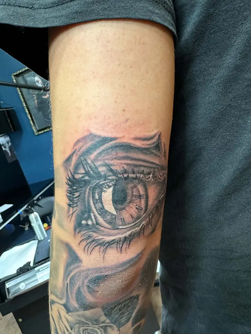 Large eye with a pale iris. Tattoo at Ink21 in Vienna.