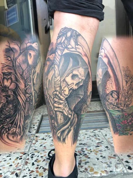Hooded skull and landscape on the leg. Tattoo at Ink21 in Vienna.