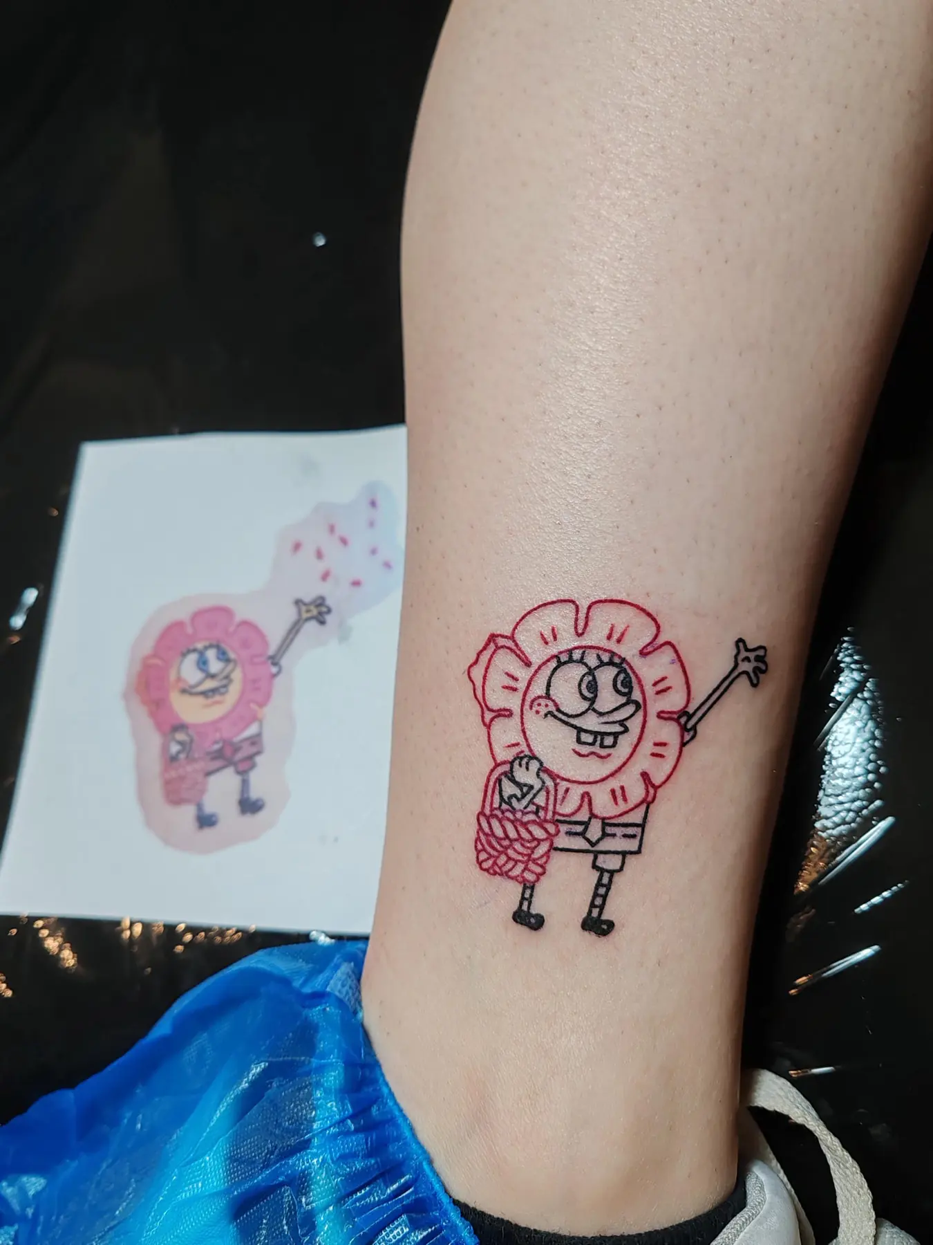 Child’s drawing as a colour tattoo. Tattoo at Ink21 in Vienna.
