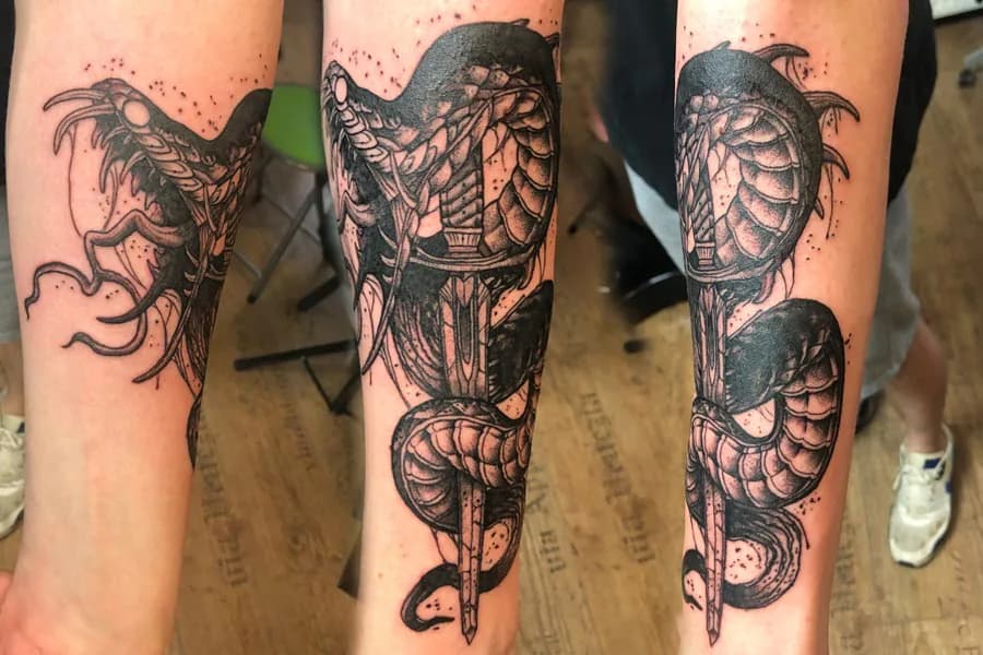 Cobra with an open mouth. Tattoo at Ink21 in Vienna.