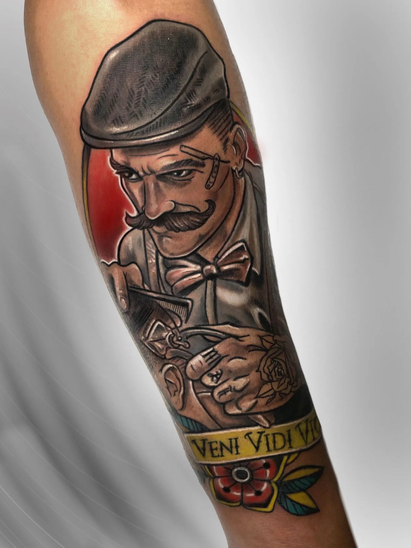 Man with a flat cap and playing cards. Tattoo at Ink21 in Vienna.