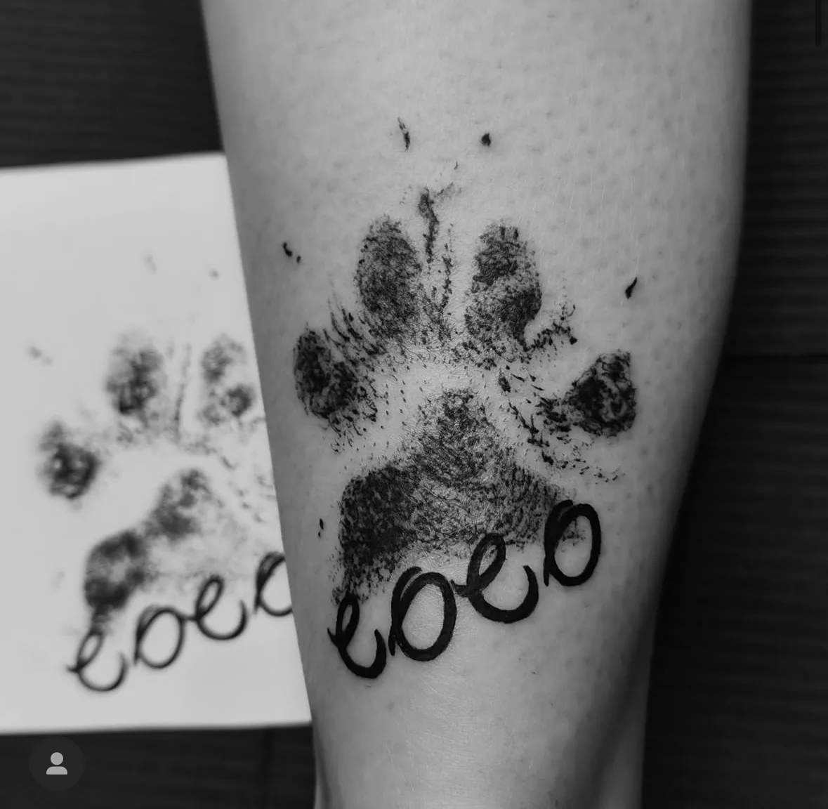 Paw print with Coco lettering. Tattoo at Ink21 in Vienna.
