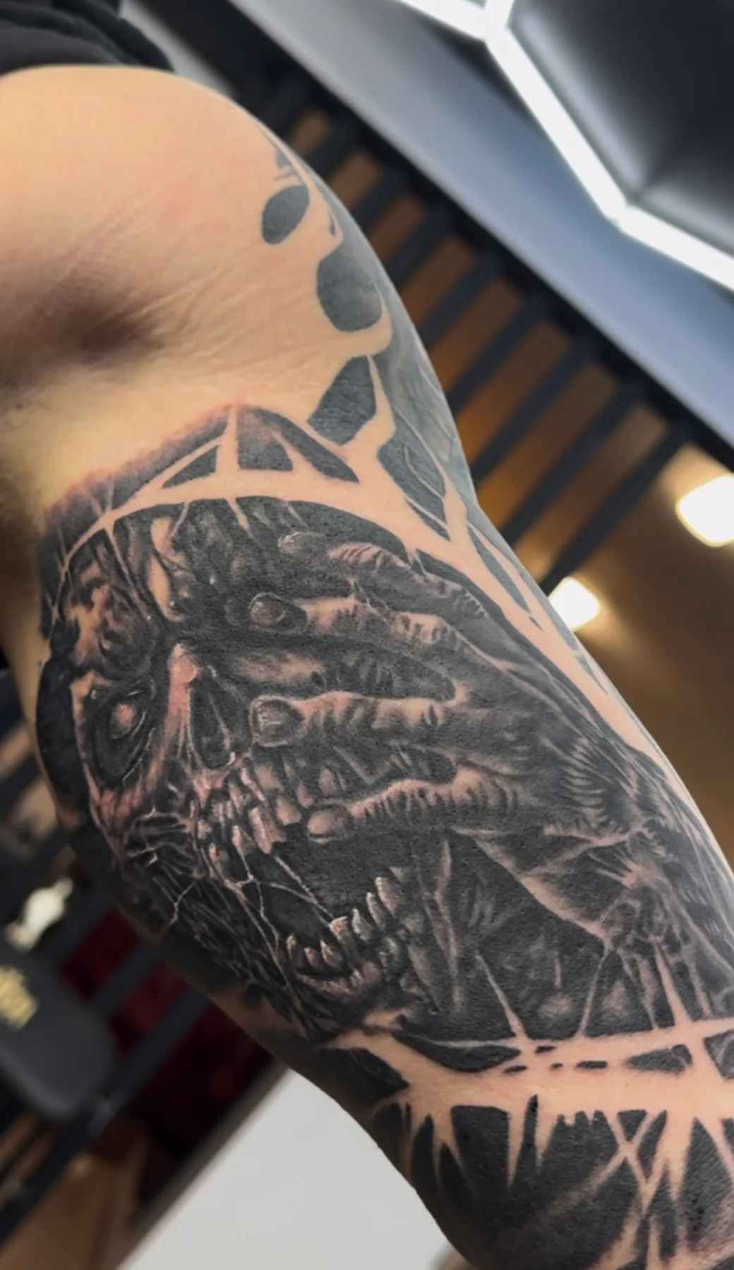 Skull and bony fingers. Tattoo at Ink21 in Vienna.