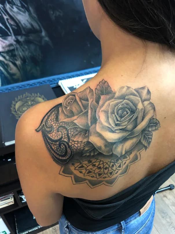 Shoulder rose with a mandala. Tattoo at Ink21 in Vienna.