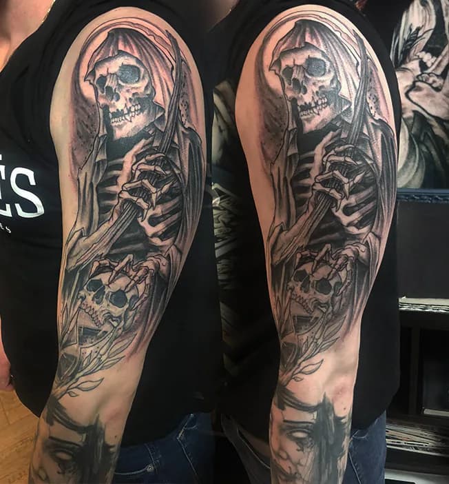 Grim reaper on the upper arm. Tattoo at Ink21 in Vienna.