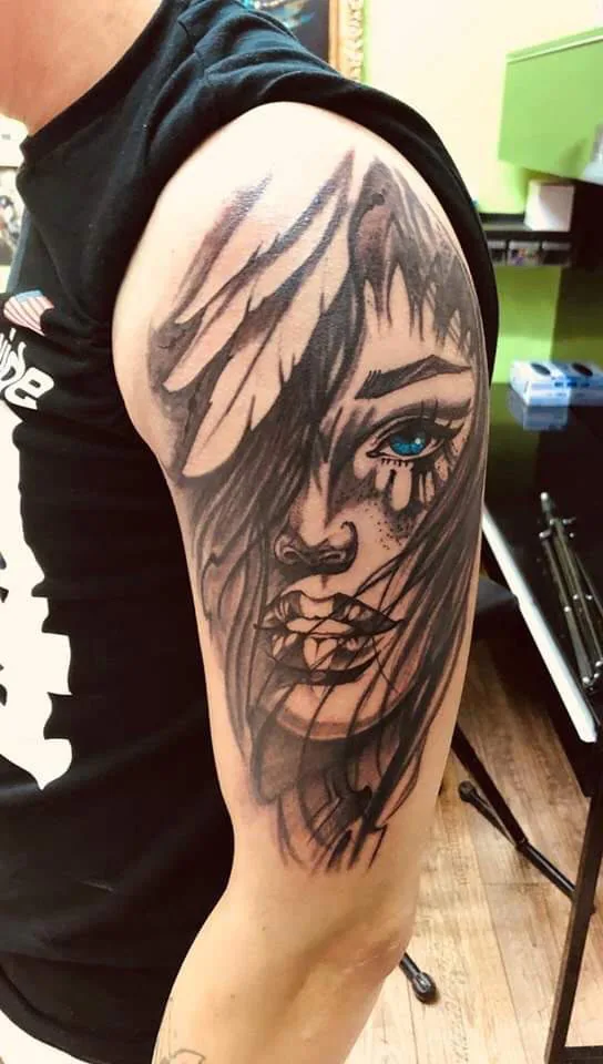 Sketch-like woman’s face. Tattoo at Ink21 in Vienna.