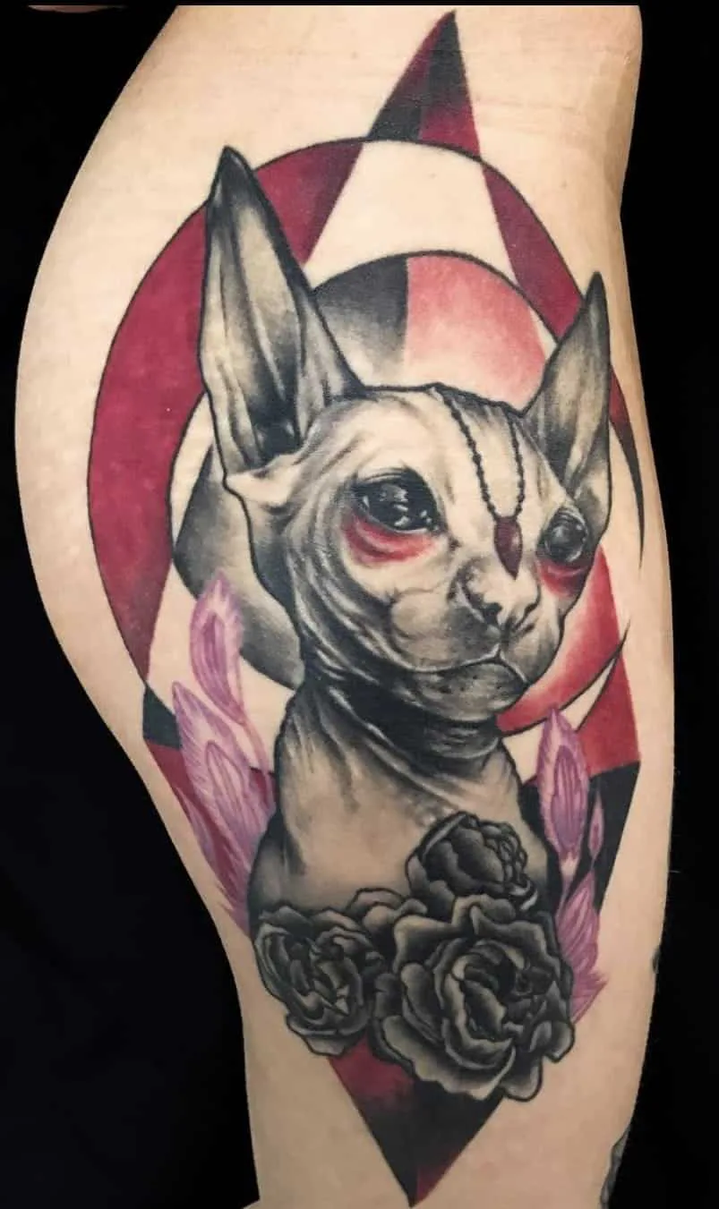 Sphynx cat with black roses. Tattoo at Ink21 in Vienna.