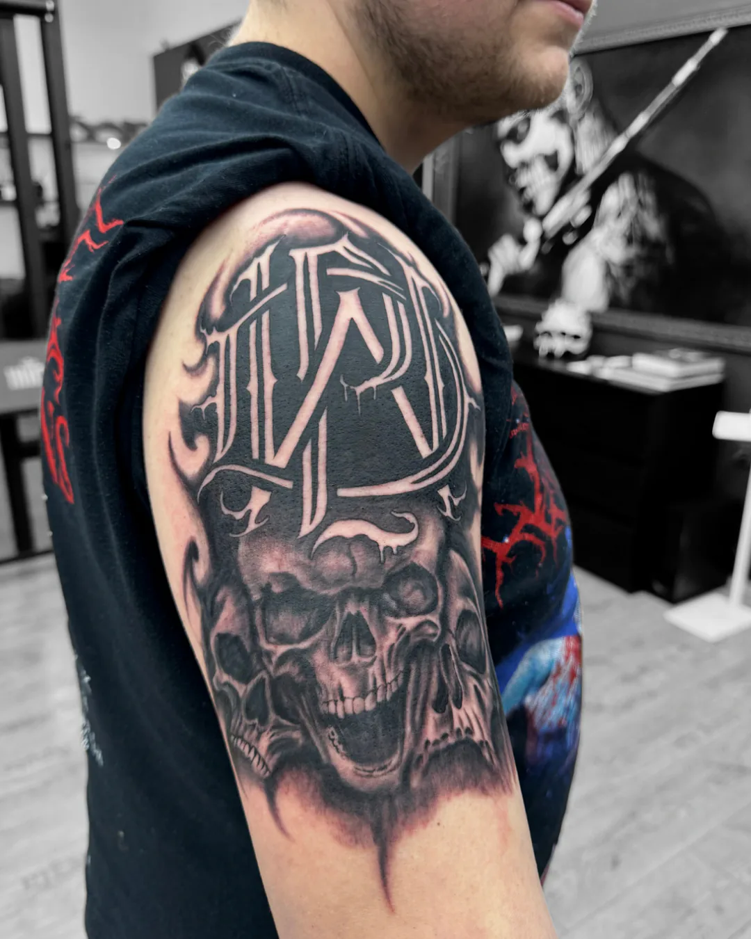 Skull with a Gothic letter. Tattoo at Ink21 in Vienna.