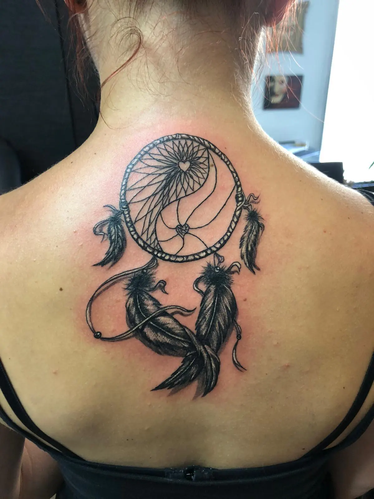 Dreamcatcher on the upper back. Tattoo at Ink21 in Vienna.
