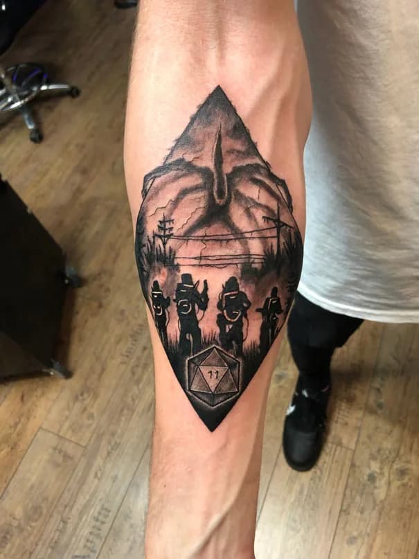 Forest and mountains inside a leaf shape. Tattoo at Ink21 in Vienna.