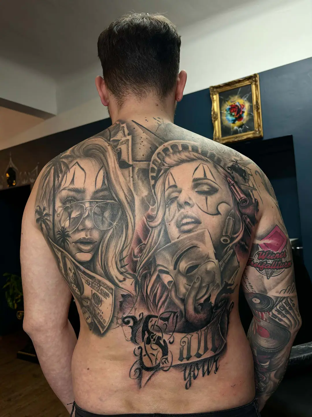 Two large women’s portraits on the back. Tattoo at Ink21 in Vienna.